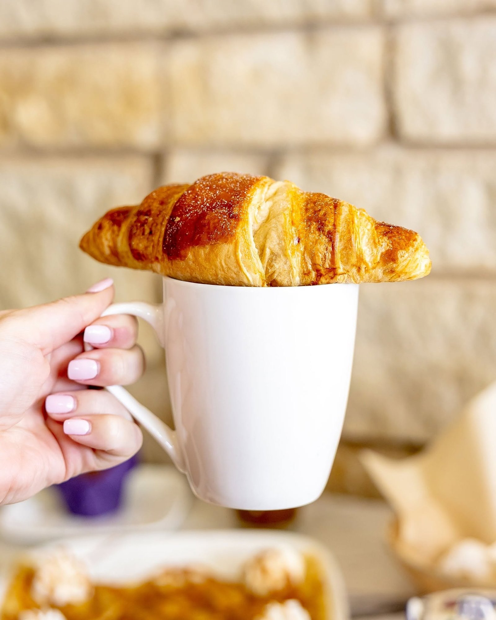Fresh baked croissant with coffee