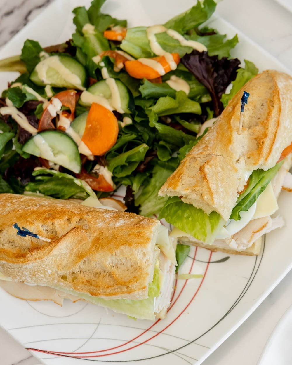 Roasted turkey baguette with side salad